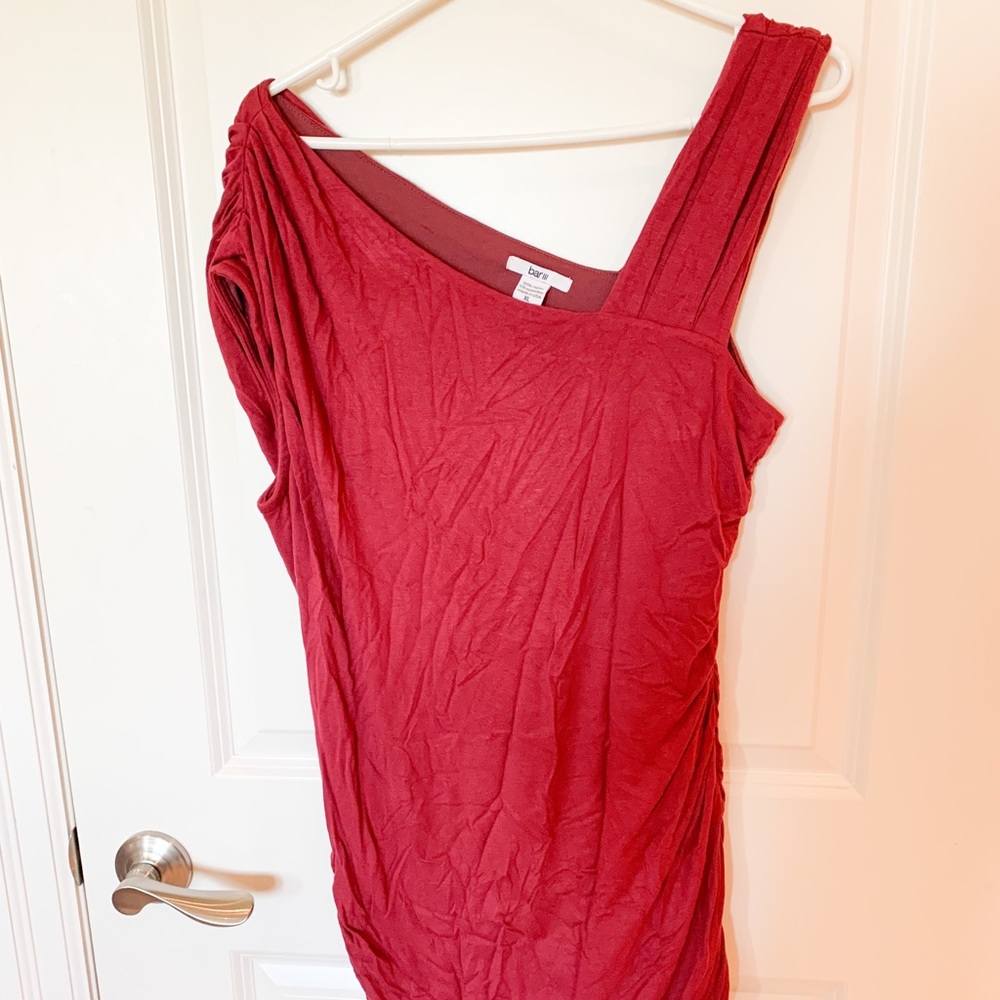 Never worn ruby red asymmetric dress with ruched sides xl